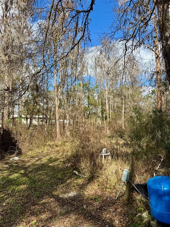 26931 DEACON LOOP, ZEPHYRHILLS, FL — photo 5 of 18