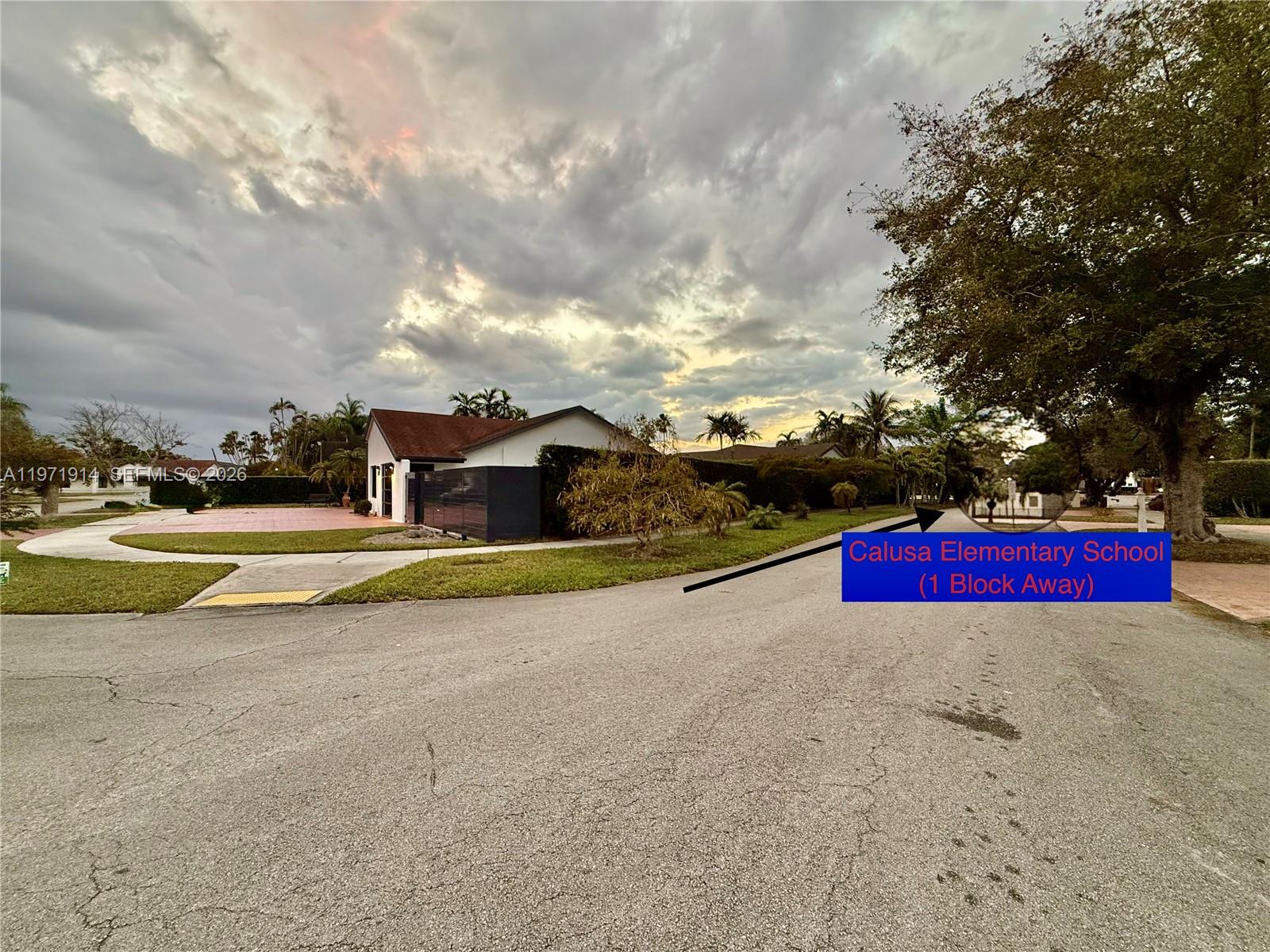 A street view shows a residential house with a driveway and a nearby elementary school — 13253 SW 96th Ter # 0, Miami FL 33186, MIAMI, FL