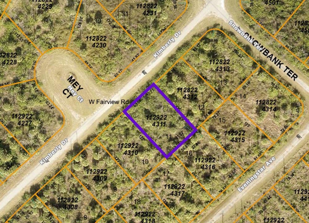This is a map showing a highlighted parcel of land located at a road intersection — KIMBERLY DRIVE, NORTH PORT, FL