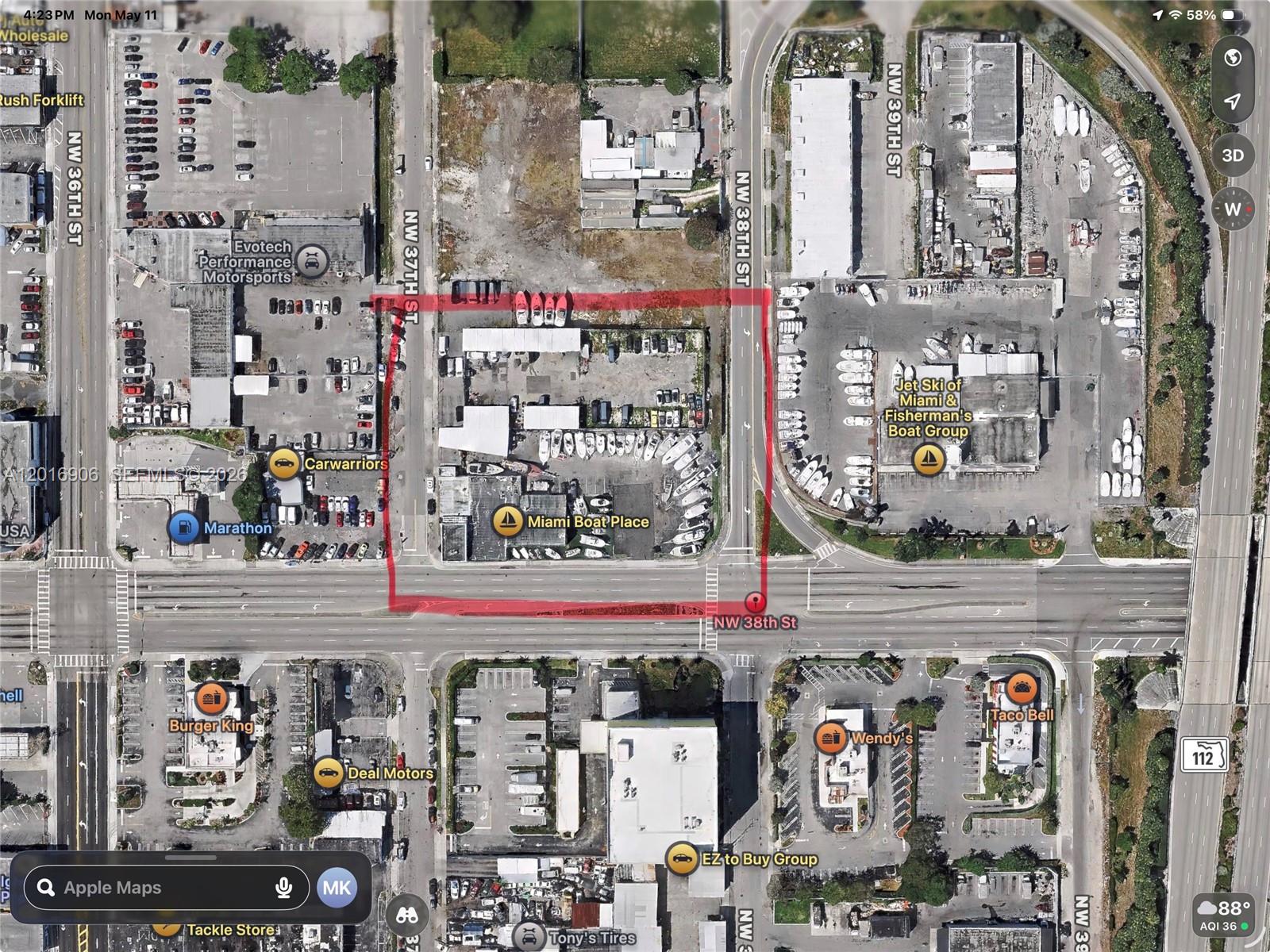 This aerial map shows a commercial property outlined in red at a busy intersection — 3700 & 3750 NW 27 AVE, Miami FL 33142, MIAMI, FL