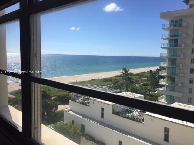 An elevated view of the ocean and beach from a window — 9511 Collins Ave # 1108, Surfside FL 33154, SURFSIDE, FL