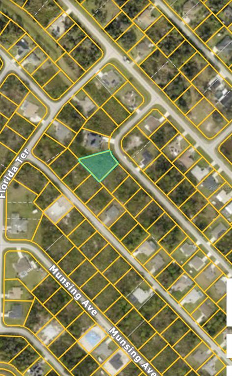 This is an aerial map showing a highlighted vacant lot in a residential neighborhood — LENAPE LANE, NORTH PORT, FL