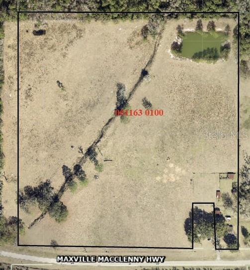 This is an aerial map showing a large, rectangular plot of land with a small pond — 20241 MAXVILLE MACCLENNY HIGHWAY, JACKSONVILLE, FL