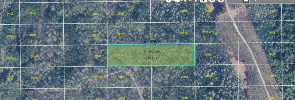 This is an aerial map showing a rectangular plot of land highlighted in green — DILL ROAD, ORLANDO, FL