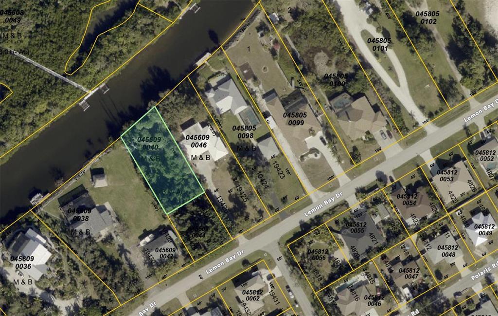 This is an aerial map showing property parcel boundaries and residential lots along a waterway — LEMON BAY DRIVE, VENICE, FL