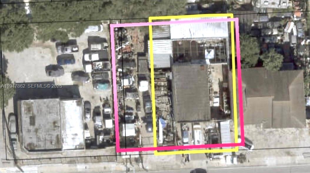 This aerial view shows a commercial property with a building and outdoor storage area — 3071 NW 54th St, Miami FL 33142, MIAMI, FL