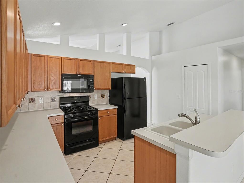 2609 MEADOW OAKS LOOP, CLERMONT, FL — photo 5 of 17