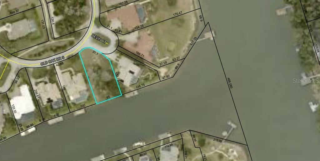 This is a satellite map showing a highlighted residential lot along a canal — 36 OLD OAK DRIVE S, PALM COAST, FL