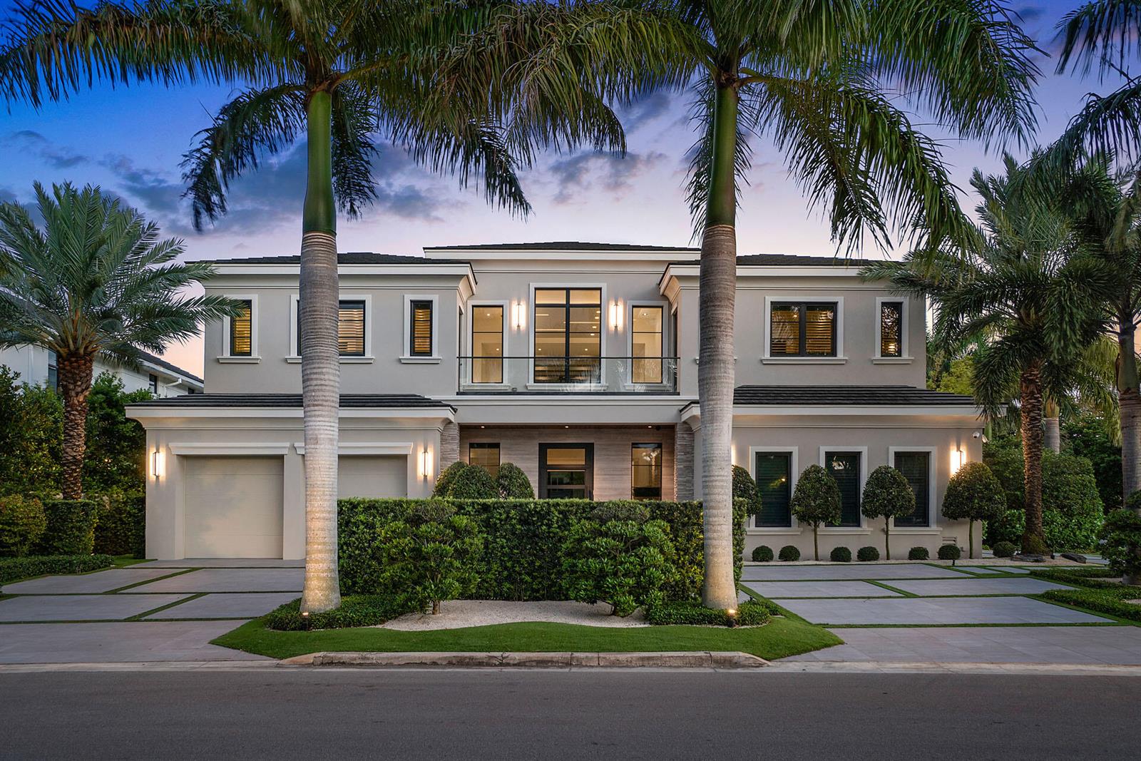 A two-story modern house with a paved driveway, palm trees, and a manicured hedge — 290 S Maya Palm Drive, Boca Raton FL 33432, BOCA RATON, FL