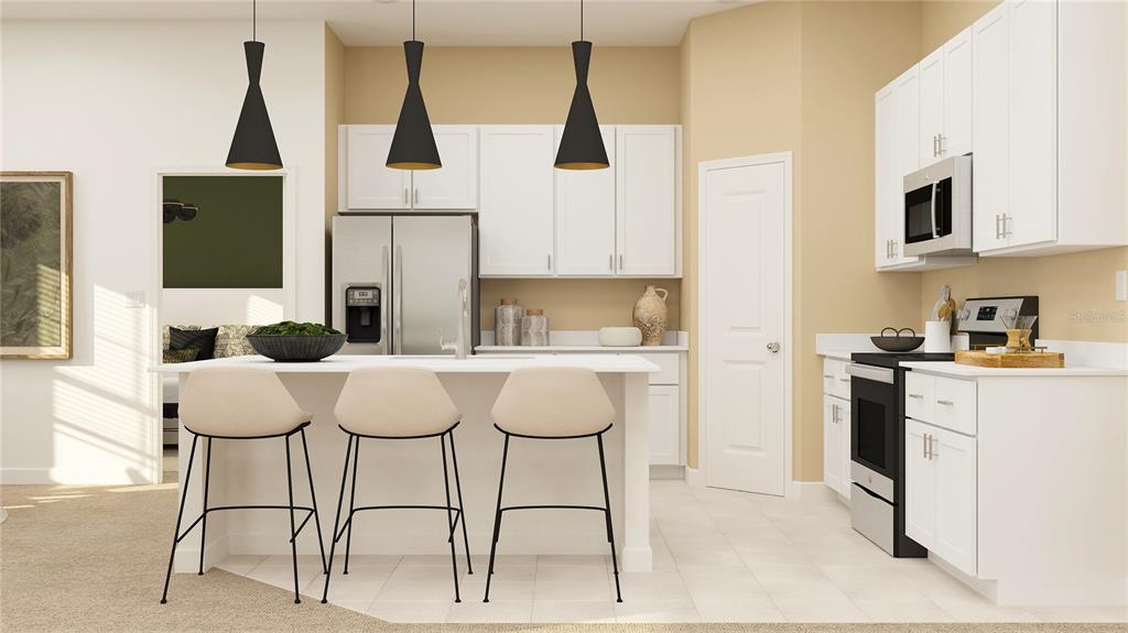 This is a rendering of a modern kitchen featuring white cabinets, stainless appliances, and island seating — 13002 PINK SAND COURT UNIT 102, VENICE, FL