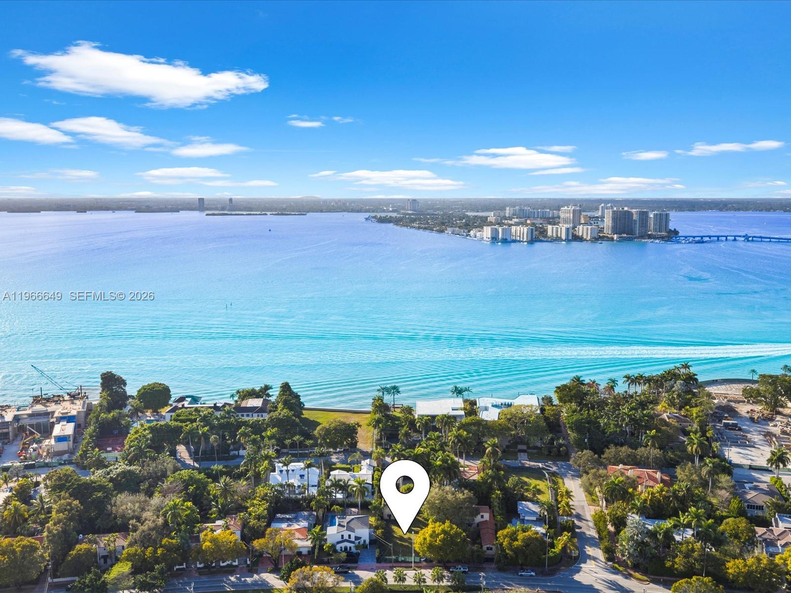 An aerial view shows a waterfront residential neighborhood with a marked property lot — 5838 Alton Rd, Miami Beach FL 33140, MIAMI BEACH, FL