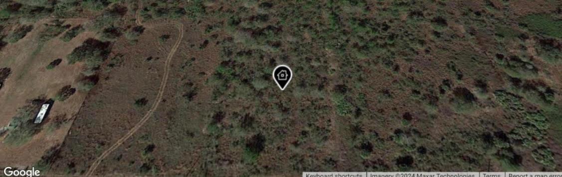 This is a satellite view of a vacant, undeveloped plot of land with sparse vegetation — 18773 NW 278th Street, Okeechobee FL 34972, OKEECHOBEE, FL