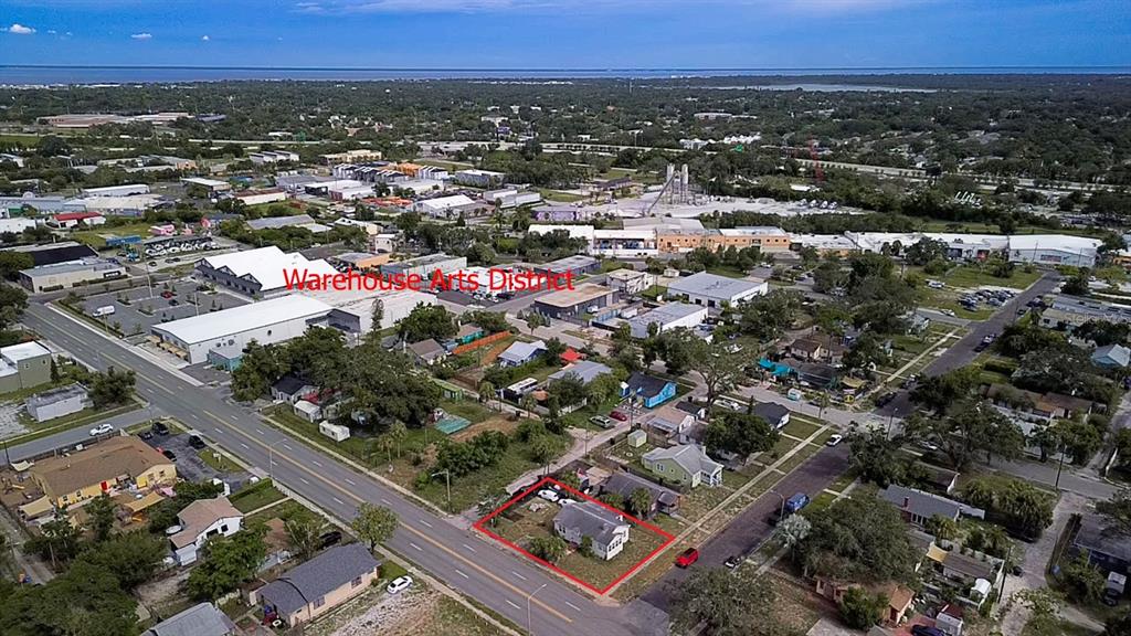 An aerial view shows a single-story house outlined in red on a residential street — 2560 5TH AVENUE S, ST PETERSBURG, FL