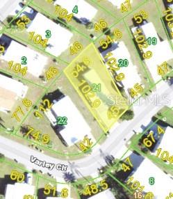This is a satellite map view showing a highlighted residential property lot and surrounding homes — 7361 VARLEY CIRCLE, PORT CHARLOTTE, FL