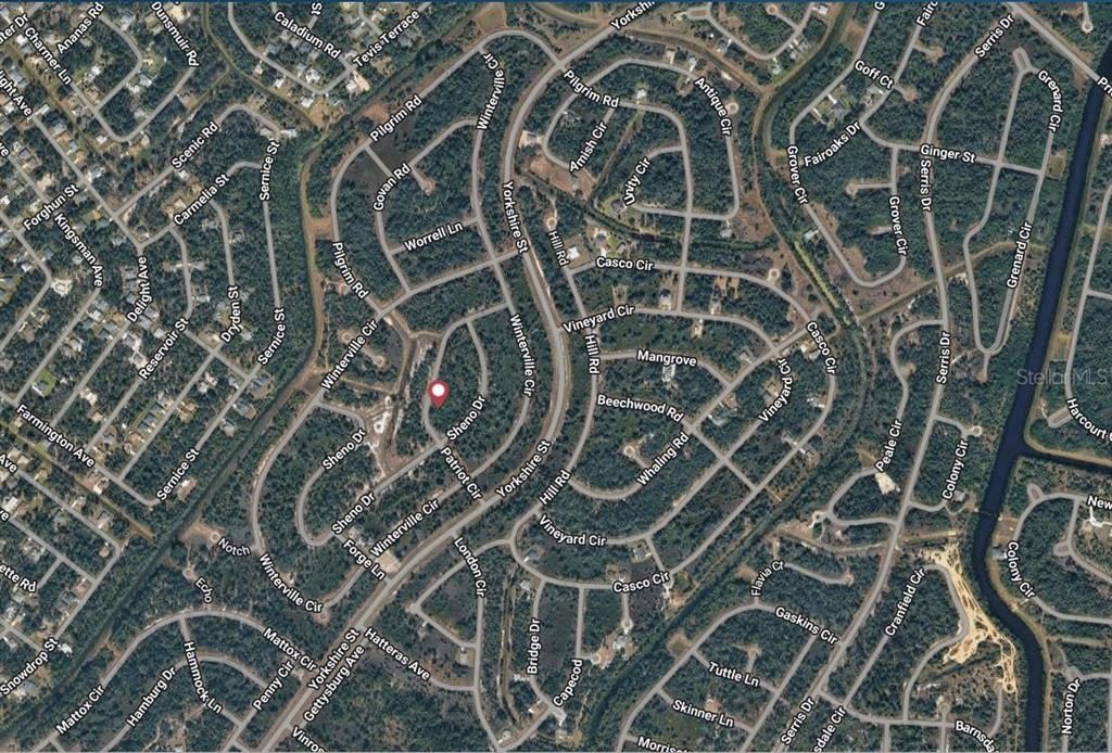 This is an aerial map view of a residential neighborhood with winding streets and houses — PATRIOT CIRCLE, NORTH PORT, FL