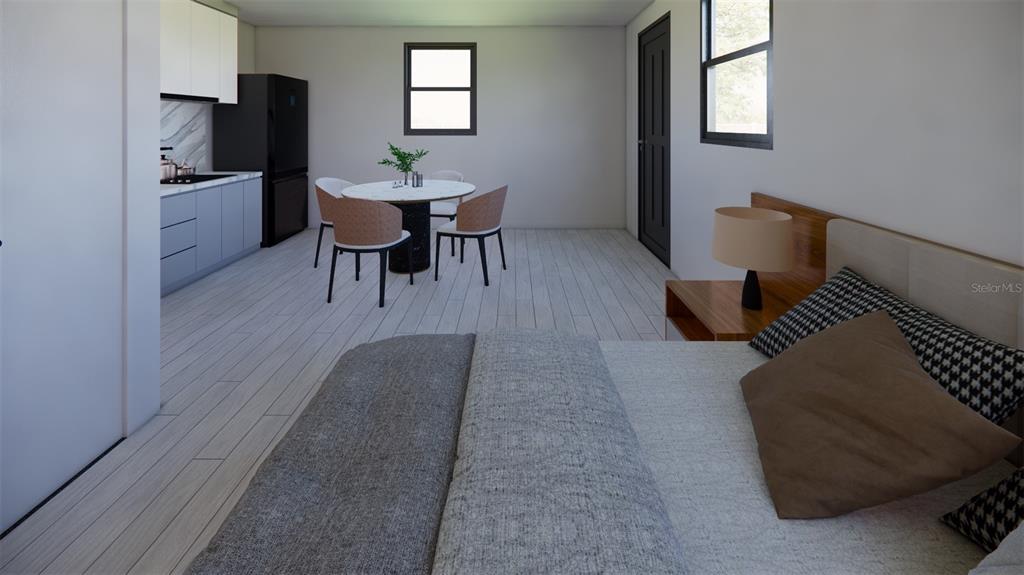This rendering shows a studio apartment with a kitchen, dining area, and bed — 202 JEFFERSON DRIVE, HAINES CITY, FL