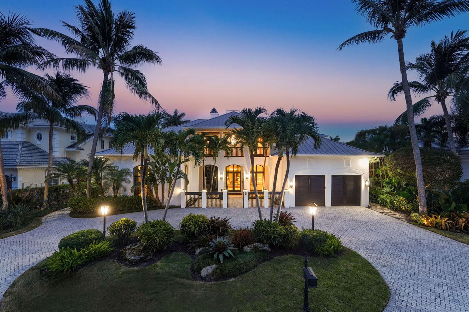 A two-story white house with a metal roof, palm trees, and a paved circular driveway — 1720 Sabal Palm Drive, Boca Raton FL 33432, BOCA RATON, FL