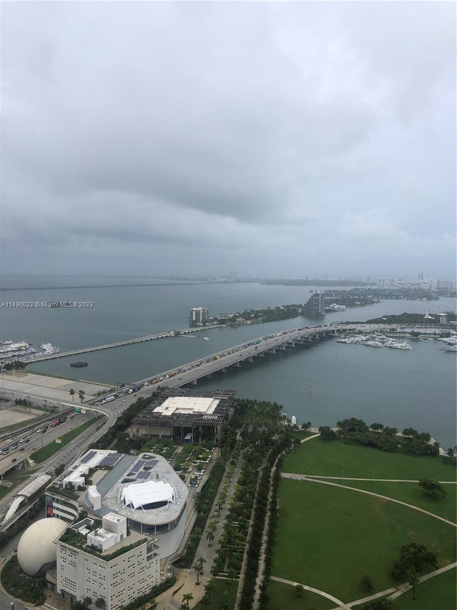 An elevated view shows a bridge spanning a bay with a park in the foreground — 900 Biscayne Blvd # 4904, Miami FL 33132, MIAMI, FL