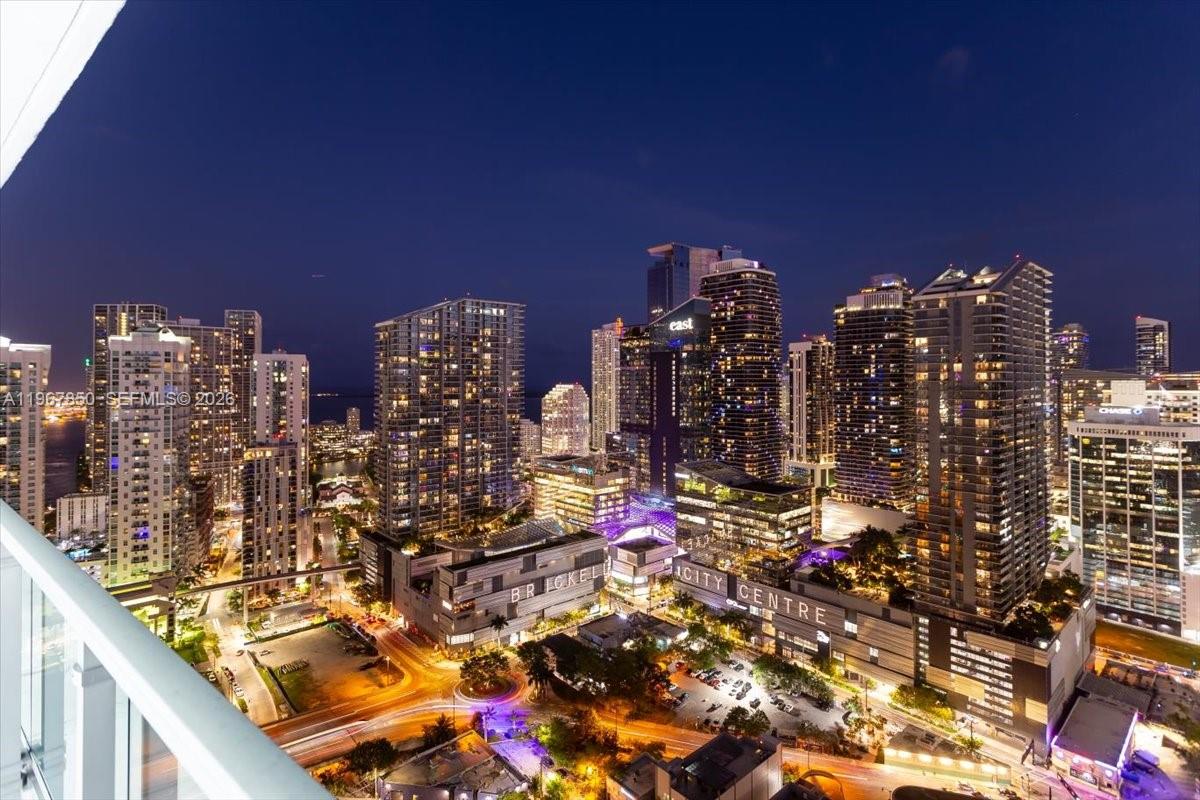 An elevated night view of the illuminated Brickell City Centre skyline and surrounding urban buildings — 92 SW 3rd St # 3804, Miami FL 33130, MIAMI, FL