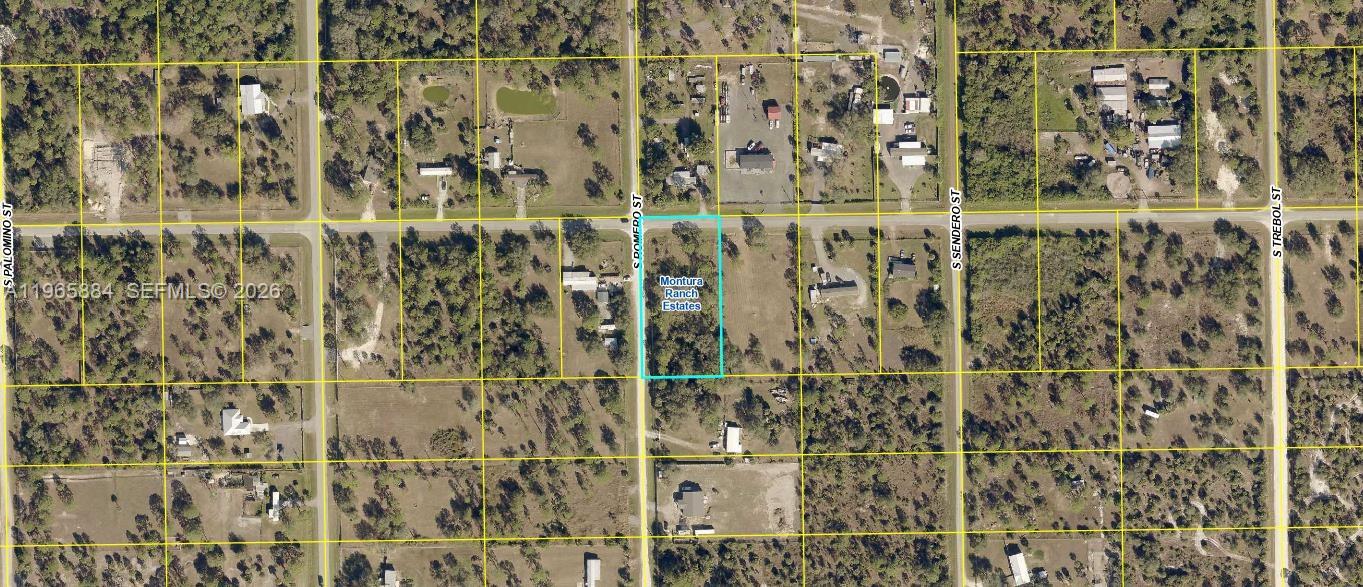This is an aerial map showing a highlighted rectangular land parcel in a rural area — 524 Montura Ave, Clewiston FL 33440, CLEWISTON, FL