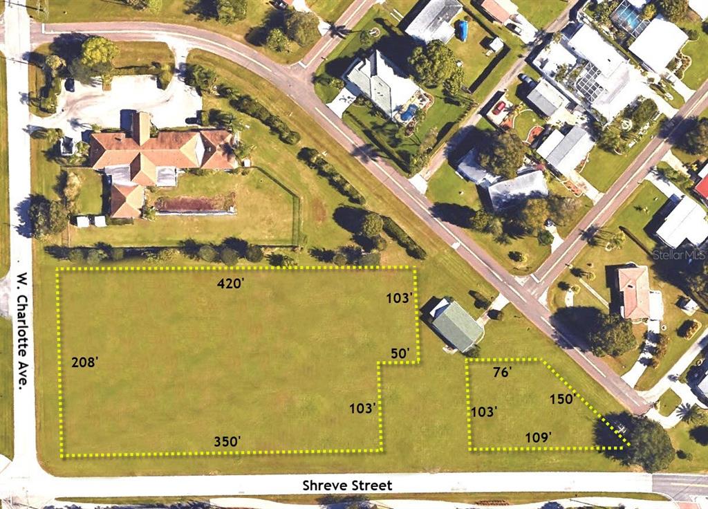This is an aerial map showing the property boundaries and dimensions of two adjacent vacant lots — 512 SHREVE STREET, PUNTA GORDA, FL