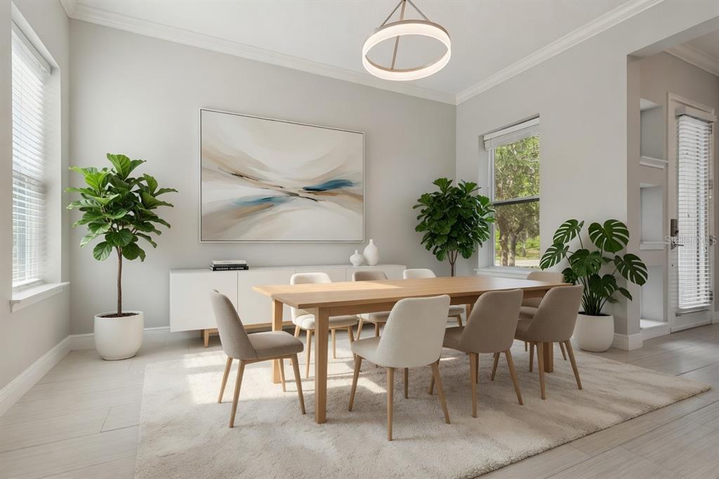 A dining room featuring a wooden table, six chairs, a sideboard, and several potted plants — 9044 TAVISTOCK LAKES BOULEVARD, ORLANDO, FL