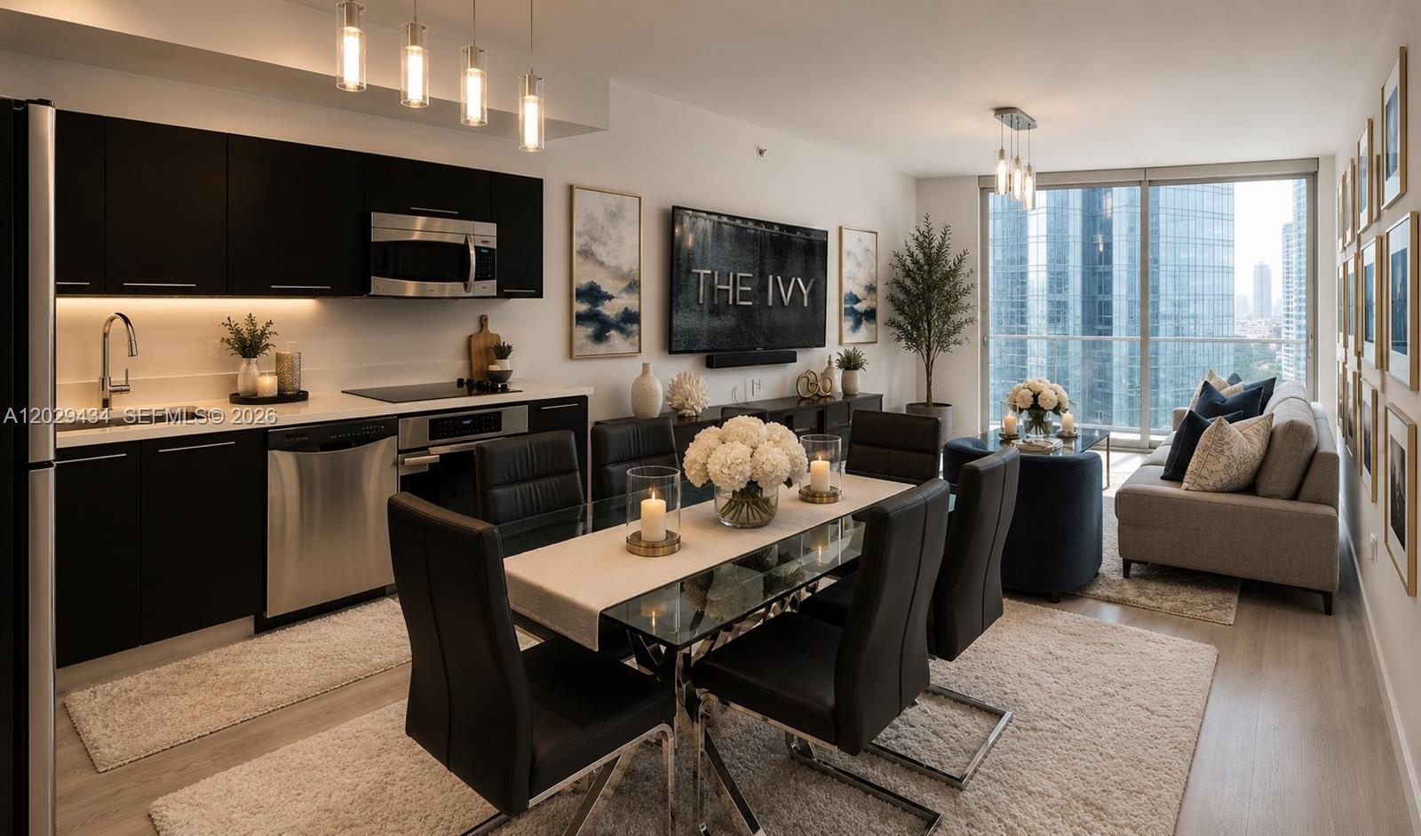 A modern open-concept apartment features a kitchen, dining area, and living space with floor-to-ceiling windows — 90 SW 3rd St # 1703, Miami FL 33130, MIAMI, FL