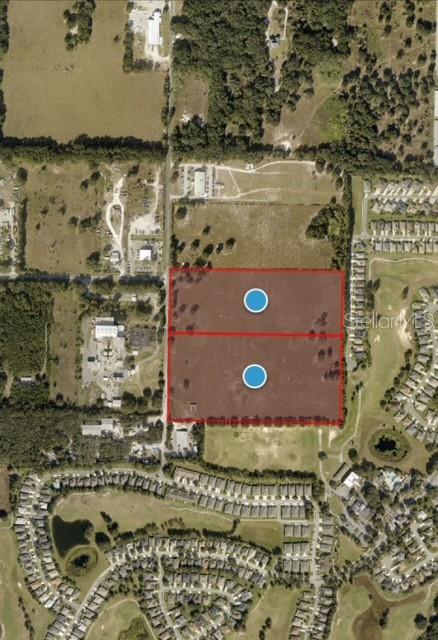 An aerial map view shows two adjacent rectangular plots of land outlined in red — HAYWOOD WORM FARM ROAD, LEESBURG, FL