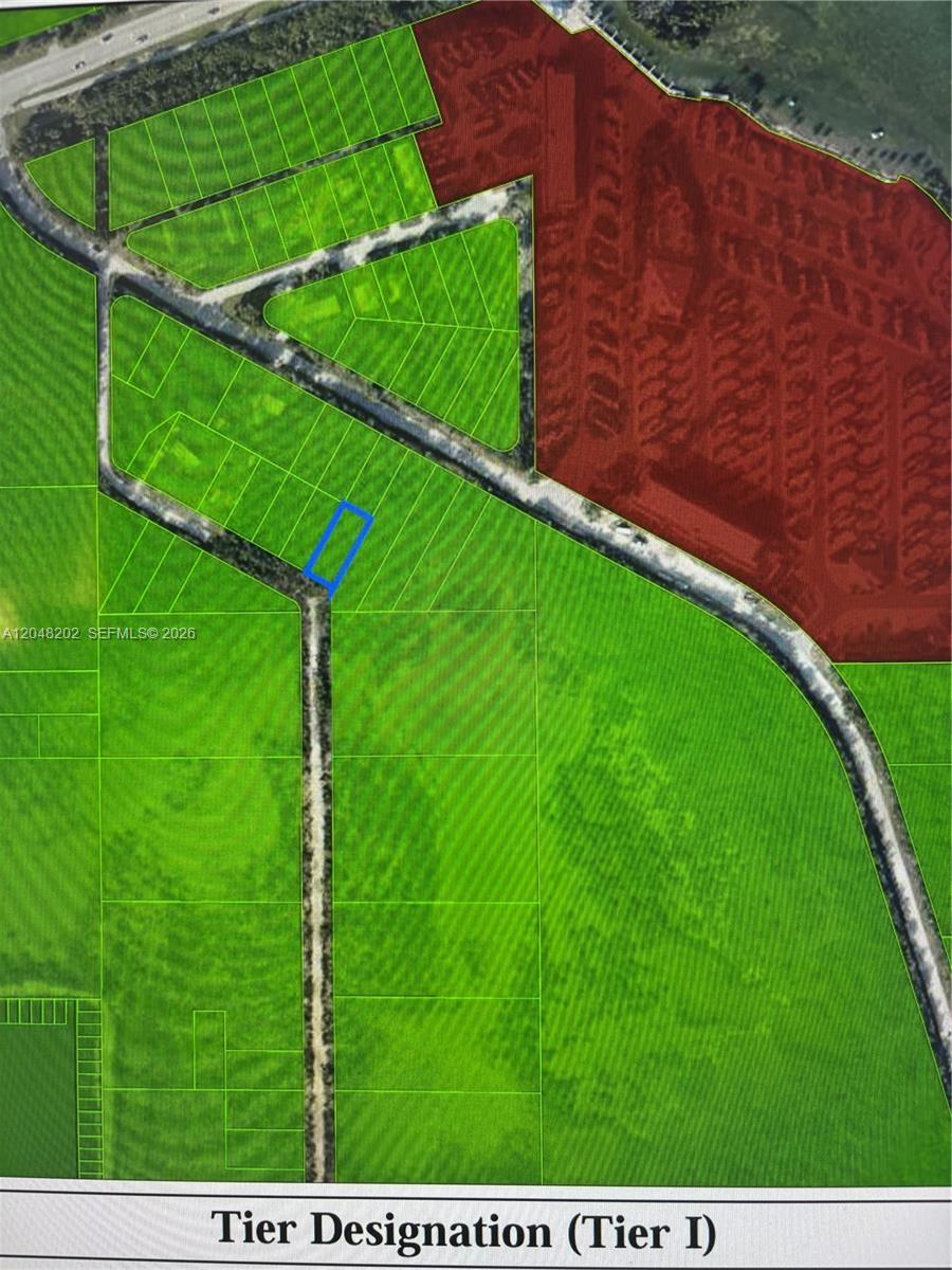 This is a map showing a specific land parcel highlighted in blue within a larger area — LOWER KEYS, FL
