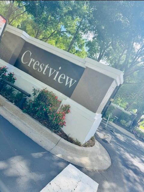 A stone monument sign for Crestview stands at the entrance of a residential community — 7135 YACHT BASIN AVENUE UNIT 239, ORLANDO, FL