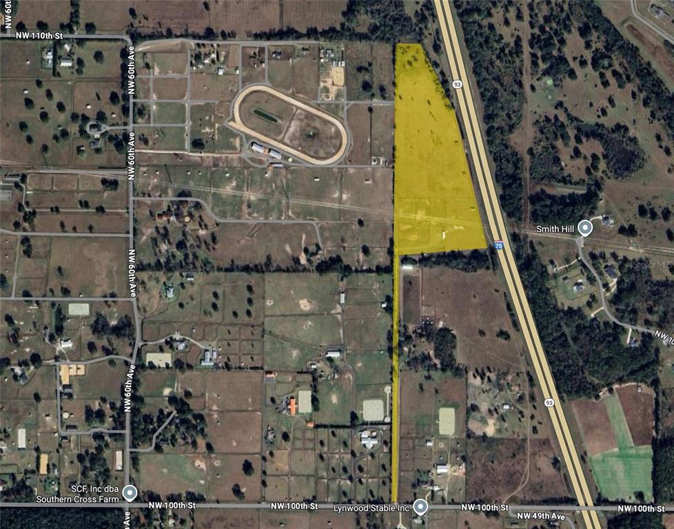An aerial map view shows a triangular parcel of land highlighted in yellow near a highway — TBD NW 100TH AVENUE, OCALA, FL