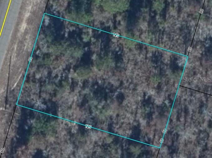 An aerial view shows a rectangular plot of land outlined in blue with dimensions — Lot 10 Unit 7 Blk 423 ALHAMBRA DRIVE, CHIPLEY, FL