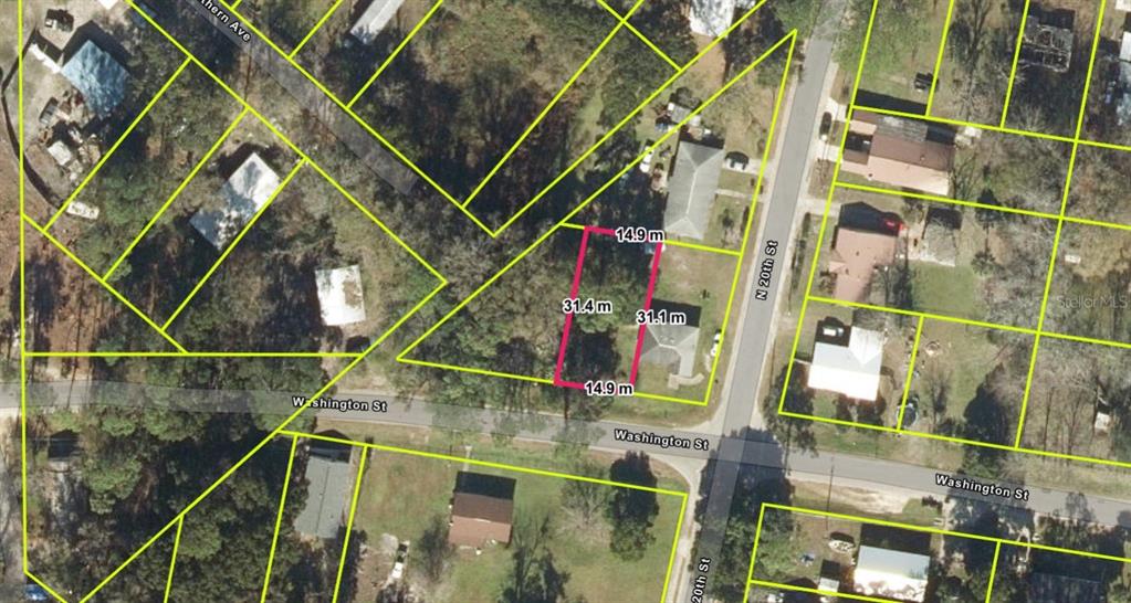 An aerial map view shows a rectangular residential lot highlighted in pink with dimensions — 1964-2082 WASHINGTON ST, PALATKA, FL