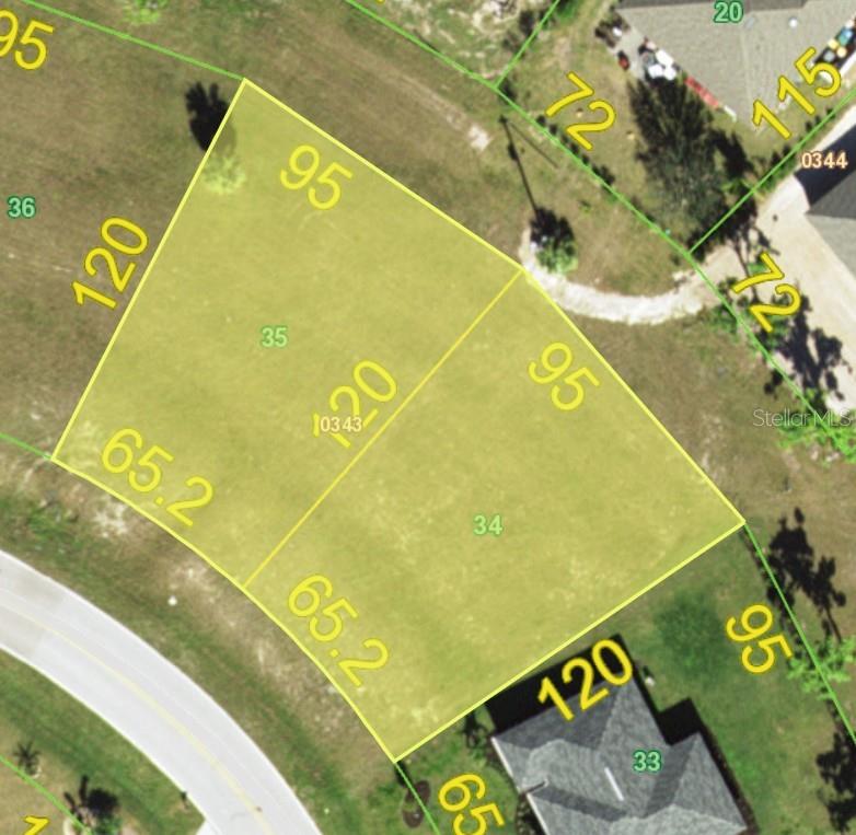 This is an aerial map view showing two adjacent vacant residential lots with property dimensions — 25418 DOREDO DRIVE, PUNTA GORDA, FL