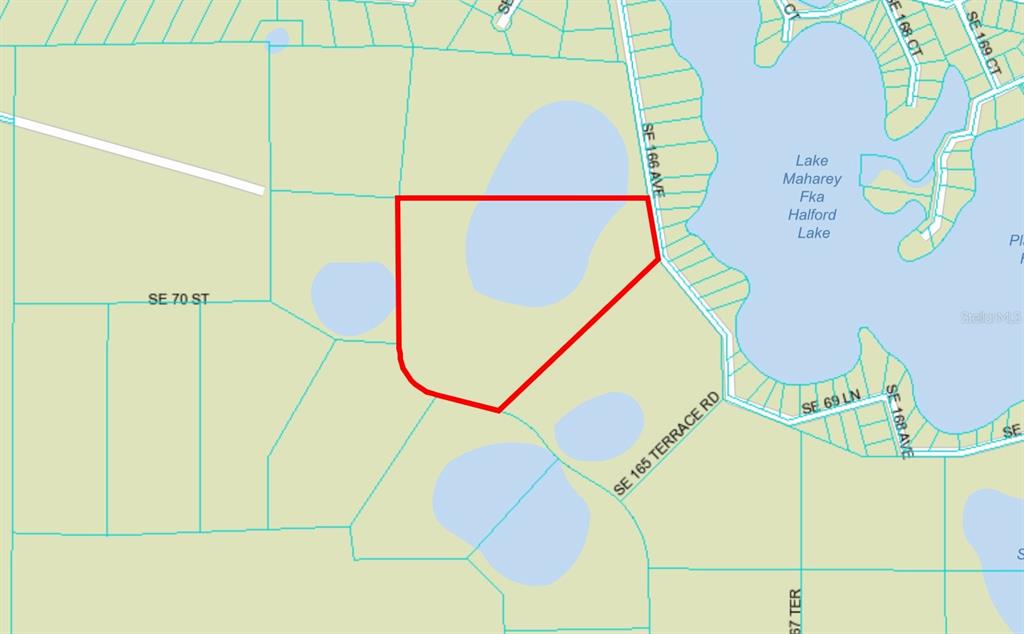 This is a map showing a parcel of land outlined in red near a lake — SE 74TH LANE ROAD UNIT 8-WEST, OCKLAWAHA, FL