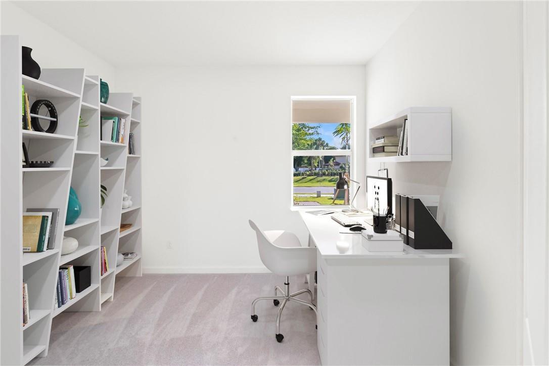 A home office features a white desk, a modern chair, and a tall slanted bookshelf — 22974 Hillshire Road, Boca Raton FL 33433, BOCA RATON, FL
