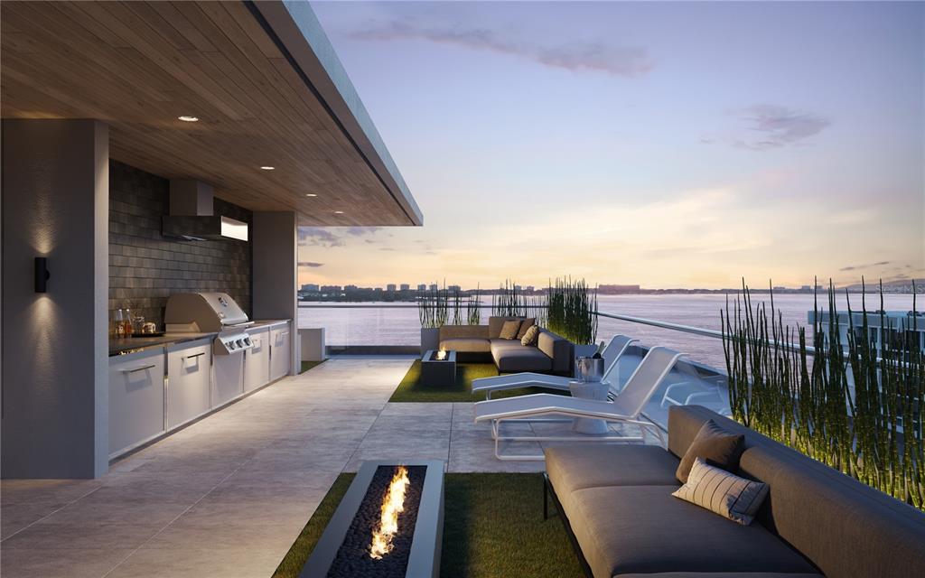This architectural rendering shows a modern rooftop terrace with an outdoor kitchen and fire pits — 688 GOLDEN GATE POINT UNIT 302, SARASOTA, FL