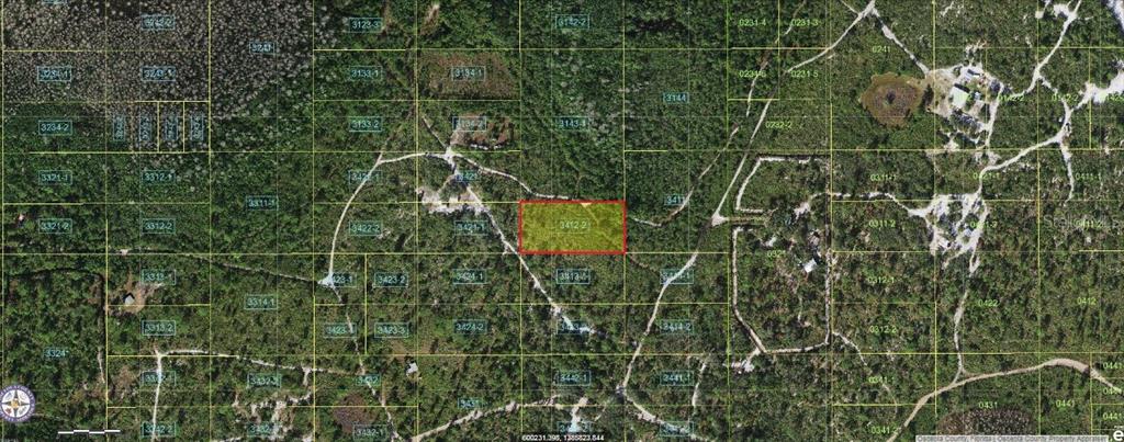 This is an aerial map showing a rectangular parcel of land outlined in red — HOLOPAW GROVES ROAD, ST CLOUD, FL