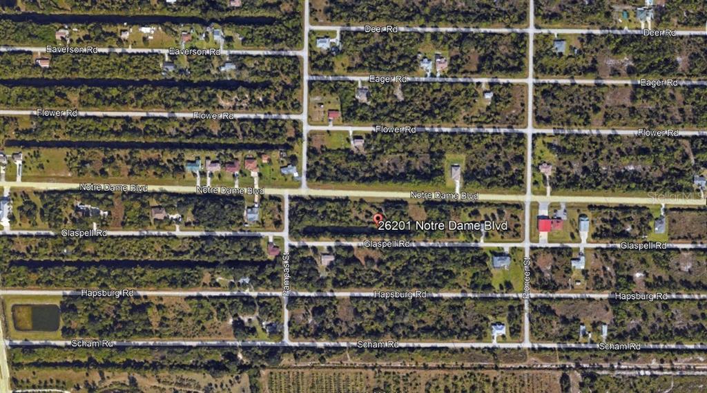 This is an aerial map view of a residential area with labeled streets and roads — 26201 NOTRE DAME BLVD, PUNTA GORDA, FL