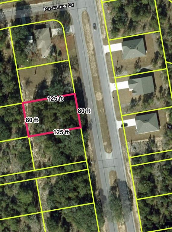 This is an aerial map showing a rectangular plot of land highlighted in pink — Lot 27 COUNTRY CLUB BOULEVARD, CHIPLEY, FL