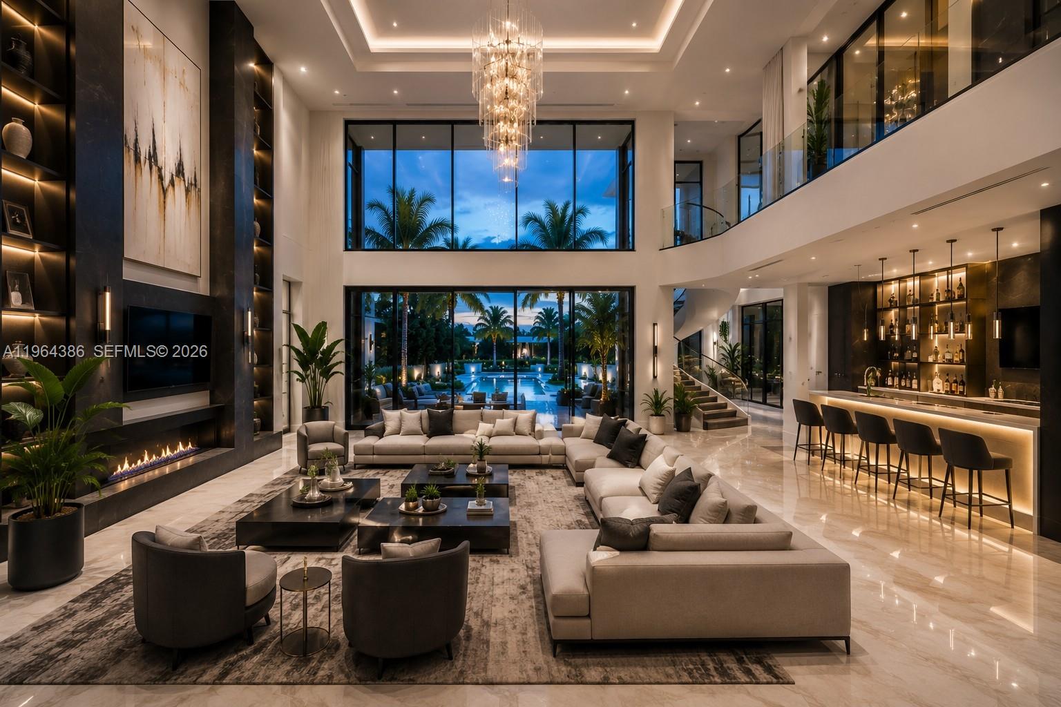 A spacious, modern living room features a double-height ceiling, fireplace, bar, and floor-to-ceiling windows — 14799 SW 48th Ct, Miramar FL 33027, MIRAMAR, FL