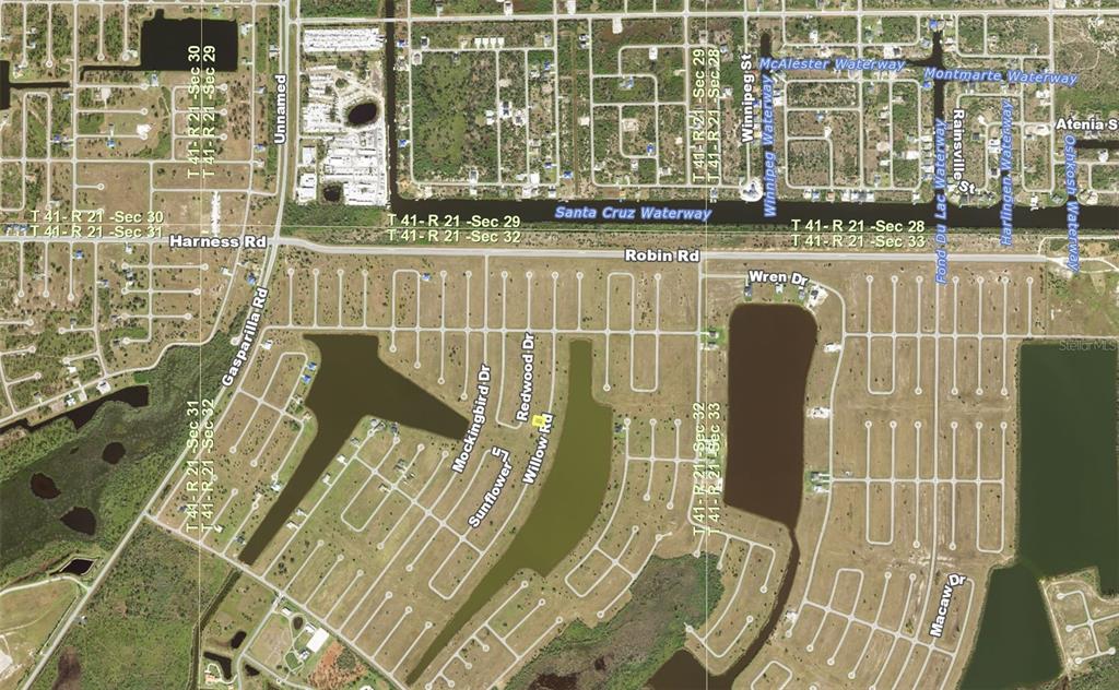 This is an aerial map showing residential streets, waterways, and land sections in a neighborhood — 85 WILLOW ROAD, PLACIDA, FL