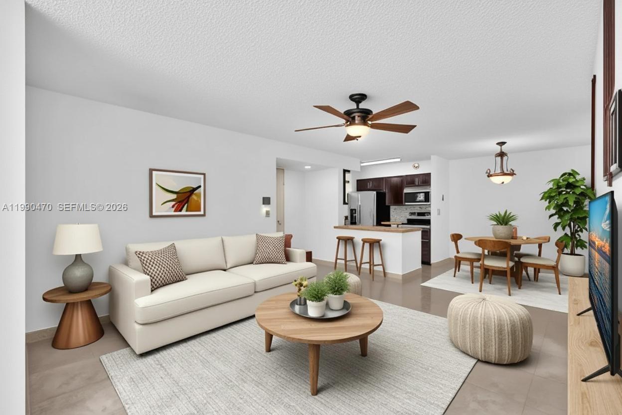 This is a digital rendering of an open-concept living and dining area with neutral decor — 2796 S University Dr # 2104, Davie FL 33328, DAVIE, FL