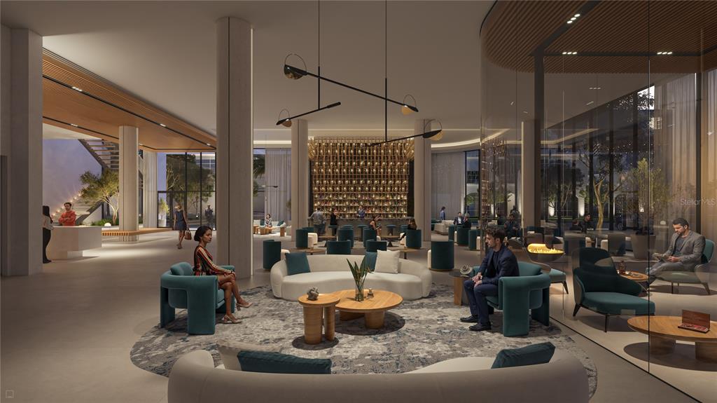 This rendering shows a modern hotel lobby featuring lounge seating, a bar, and floor-to-ceiling windows — 1101 E JACKSON STREET, TAMPA, FL