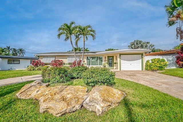 A single-story house with a white garage and two palm trees in the front yard — 1131 SE 5th Avenue, Pompano Beach FL 33060, POMPANO BEACH, FL