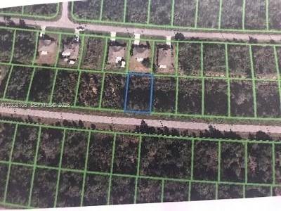 An aerial map shows a rectangular plot of land highlighted in blue among vacant lots — 8030 SUN N LAKES BLVD, Sebring FL 33872, SEBRING, FL