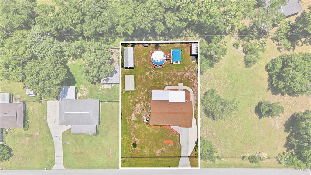 An aerial view shows a house with a backyard pool and shed on a lot — 7606 E SAVANNAH DRIVE, FLORAL CITY, FL
