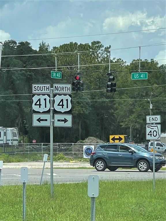 A street intersection features traffic lights and road signs for US 41 and SR 40 — TBD SW 59TH LANE, DUNNELLON, FL