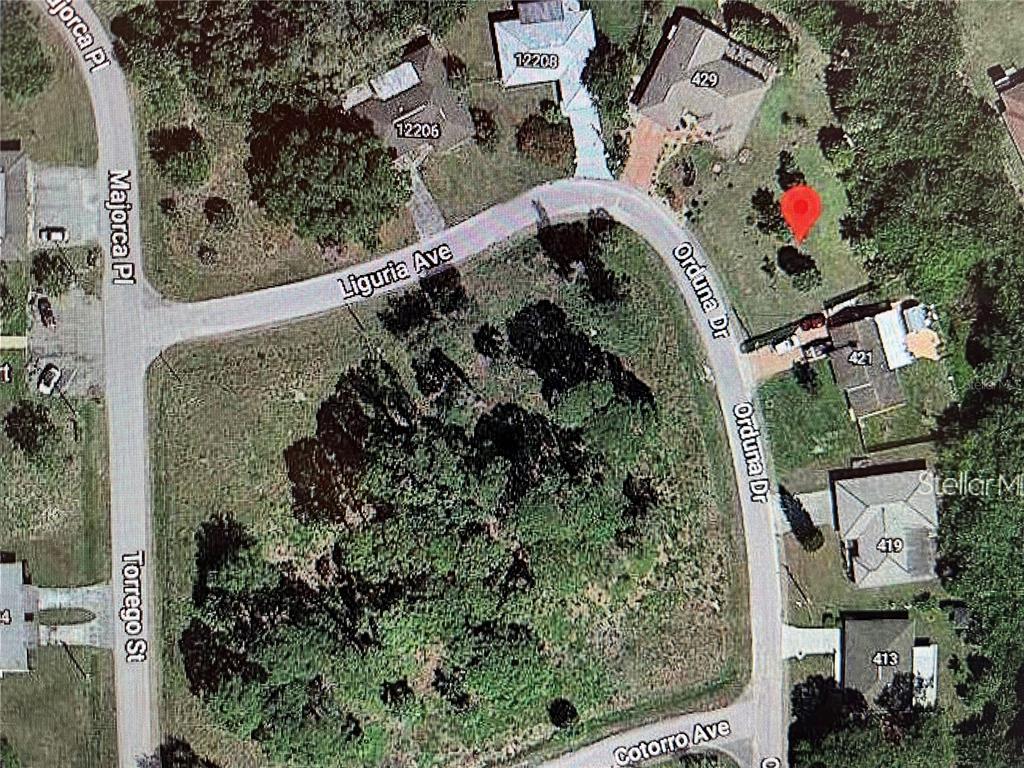 This is an aerial map view of a residential neighborhood with streets and houses — LOT 47 ORDUNA DRIVE, NORTH PORT, FL