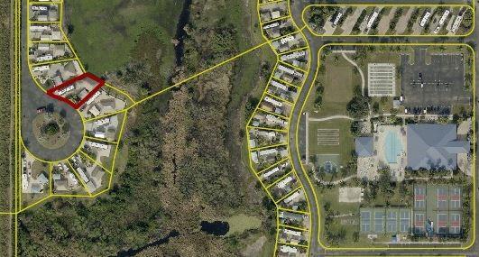 This aerial map shows a residential community with a highlighted lot and nearby amenities — Lot 209 3720 SW 7th Manor, Okeechobee FL 34974, OKEECHOBEE, FL
